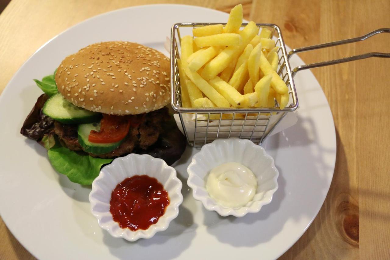 Hotel Restaurant Roessli Uetendorf Bagian luar foto